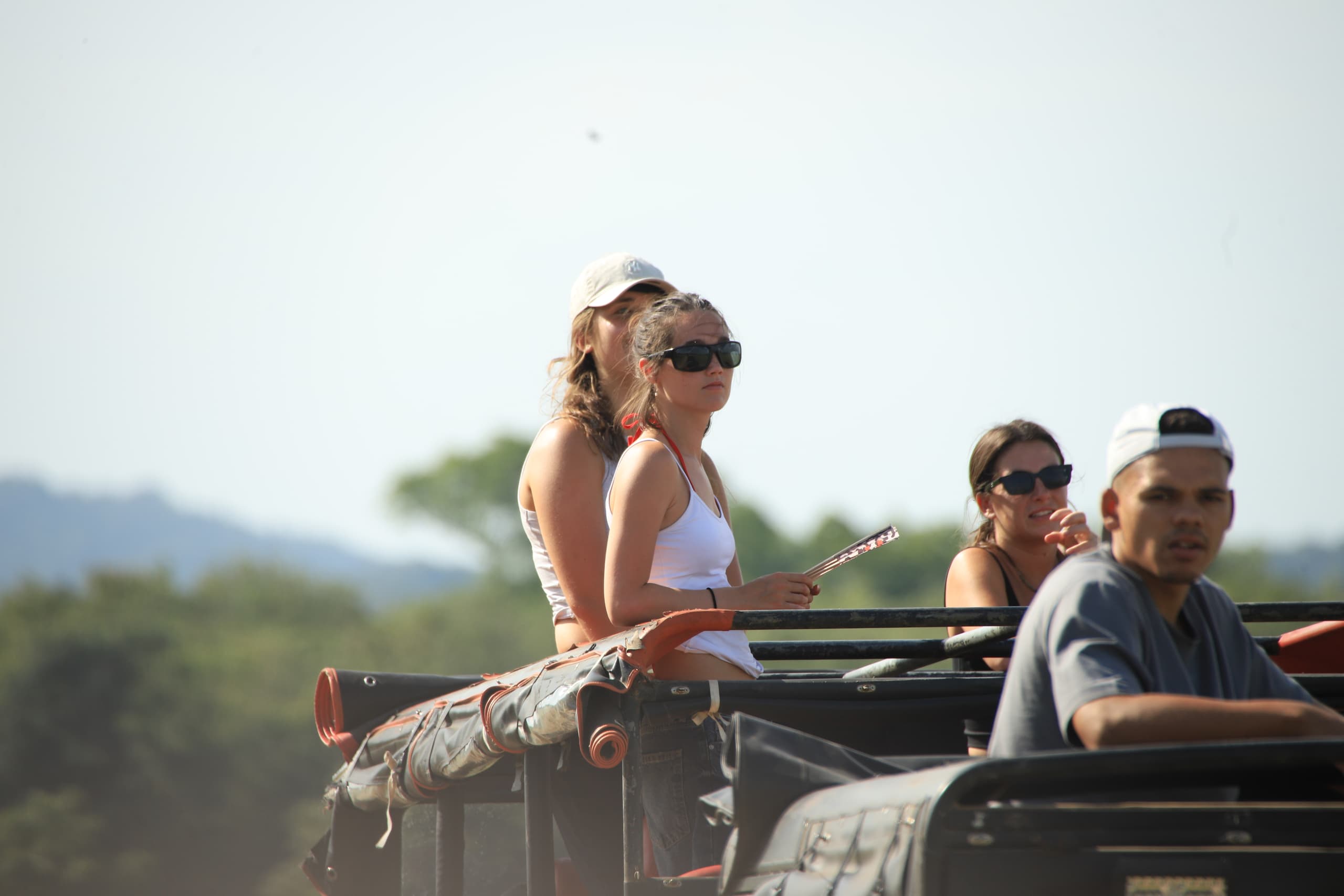 A private safari jeep among elephants on the Minneriya reservoir bed