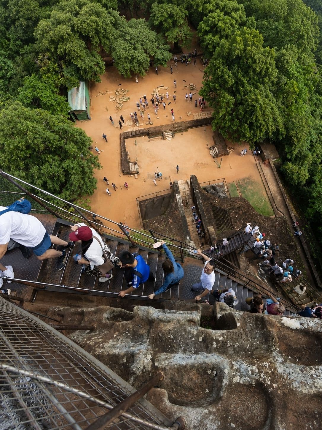 The spiral staircase to the Sigiriya fresco gallery in early light
